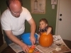 Kenny & James carving a pumpkin 